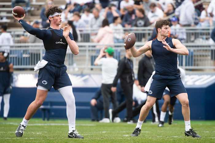Penn State quarterbacks Drew Allar and Beau Pribula throw during pregame drills.